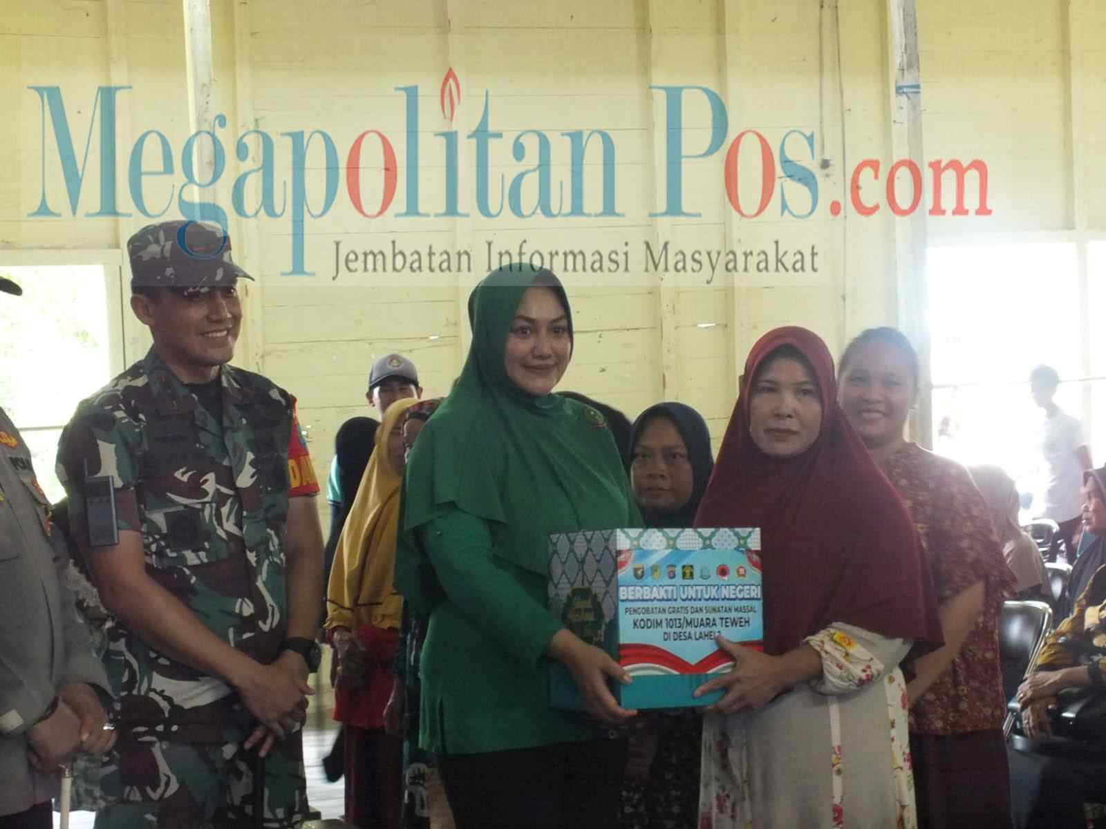 Kodim 1013 Muara Teweh Laksanakan Kegiatan Baksos Integrasi Terhadap Masyarakat Terdampak Banjir Di Kecamatan Lahei 